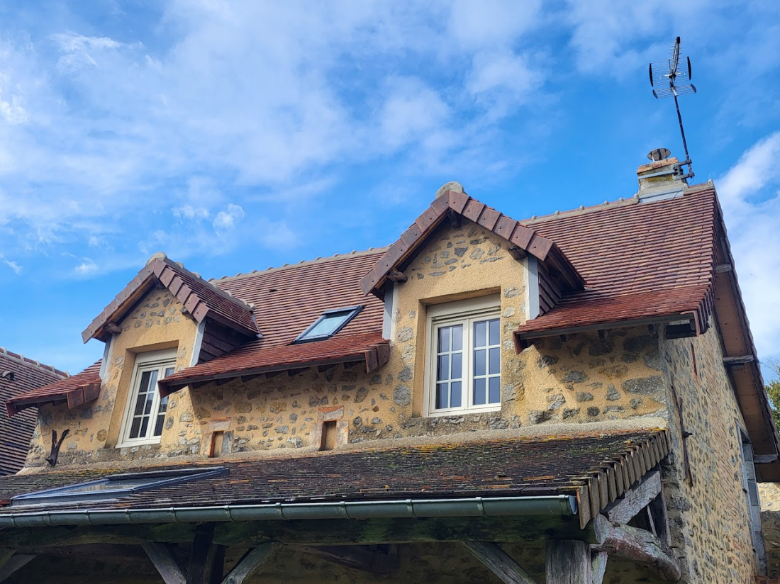 Rénovation d'une toiture en tuiles plates