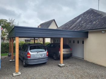 Carport en toit plat EPDM et bardage gris anthracite